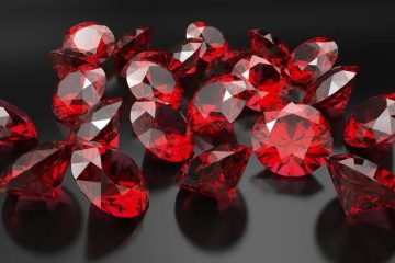 Rubis vermelhos sobre superfície escura
