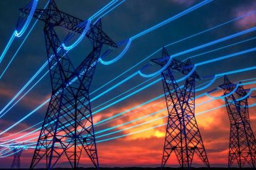 Linhas de transporte de electricidade ao pôr-do-sol