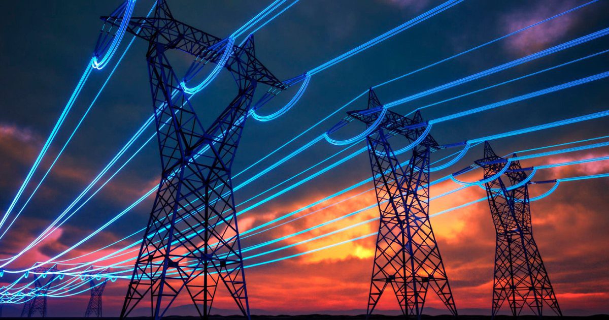 Linhas de transporte de electricidade ao pôr-do-sol